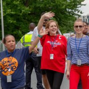 Returning hikers wave.