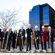 NIH leadership use shovels to break ground