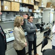 Collins and Fleming visit Tisdale and Drysdale in a lab