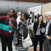 Dr. Gottesman visits poster presenters.