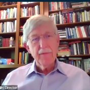 Dr. Collins speaks from his home office via video.