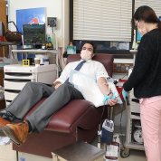 Brady donates blood.