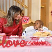 First lady and child at table