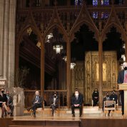 Collins speaks from the lectern