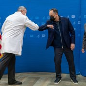 Graham and Emhoff bump elbows