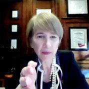 Screen shot of Johnson looking into camera