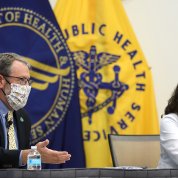 Gordon and Chung sit next to each other on a panel 