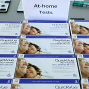 Two boxes feature QuickVue's logo