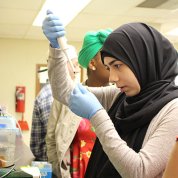 Alhabib practices pipetting in a lab