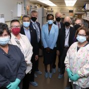 Inside the lab, group shot of people in masks