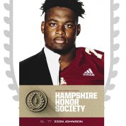 headshot of Johnson in college honor society frame