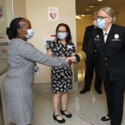 Parker shakes hands with Levine