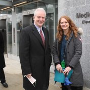 Elrich, Van Hollen & Schwetz stand outside at a Metro station