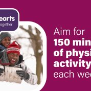 The graphic features the words "Aim for 150 minutes of physical activity each week" next to a photo of a man and child sledding face first down a hill
