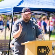 Browne at NIH podium outside