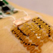 Smart bandage attached to sensors on a person's forearm