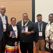 Group photo taken in conference room