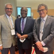 Parthasarathy, Mensah; and Pérez-Stable pose together.