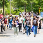 Walkers participate in the hike