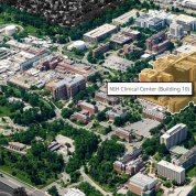 A screenshot shows an aerial view of dozens of buildings on NIH's campus, with the Clinical Center highlighted in orange.