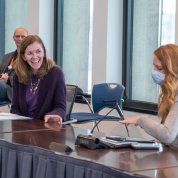 McGowan speaks at a conference table