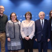 A group photo featuring Reed and several NIH employees