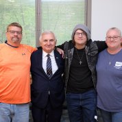 Reed with a patient and his parents