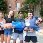 Four members of PEP in your stepTIDES hold their fifth runner.