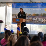 Gentille speaks at a podium