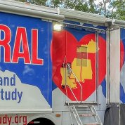 A long mobile van with a painted red heart and reads Rural Heart and Lung Study, Supporting Healthy Hearts and Lungs in the Rural South