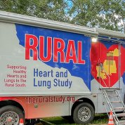 A long mobile van with a painted red heart and reads Rural Heart and Lung Study, Supporting Healthy Hearts and Lungs in the Rural South