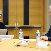 Marrazzo speaks with Hamaguchi at conference table