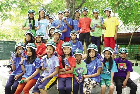 Kids with bike helmets