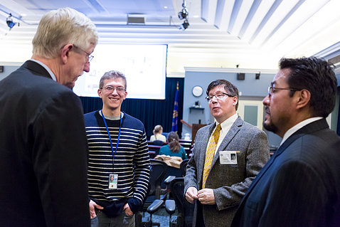 Sorensen chats with NIH officials.