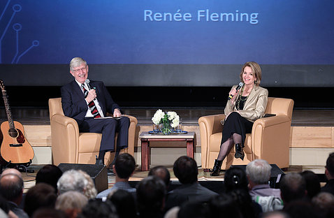 Collins and Fleming speak on stage
