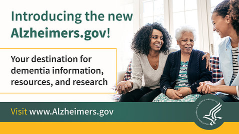 Two women hug a grey-haired older woman on a poster that reads: Introducing the new Alzheimers.gov