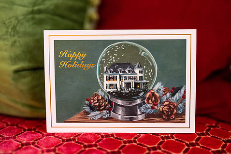 The card features the vice president's home inside a snow globe, with Happy Holidays in yellow and red border