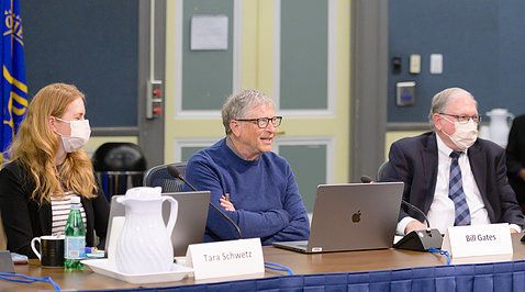Seated at a conference table, Schwetz, Gates and Tabak