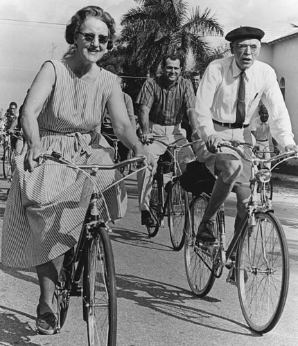White and his wife Ina riding bicycles together