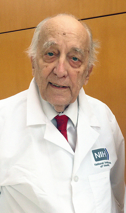 Waldmann in NIH white lab coat