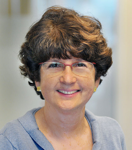 Head shot of a smiling Dr. Sharon Plon