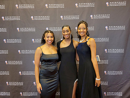 Bostick (l), Lewis (c) and Rankin, smile in formal gowns