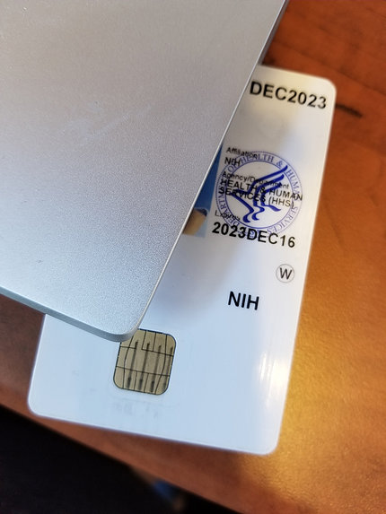 An NIH PIV card with the expiration date of Dec. 2023