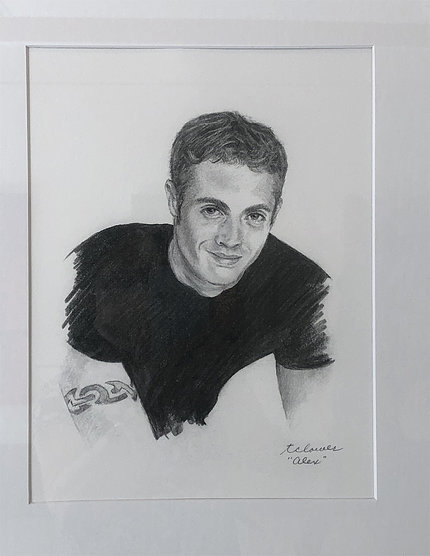 Charcoal portrait of young man in a dark t-shirt