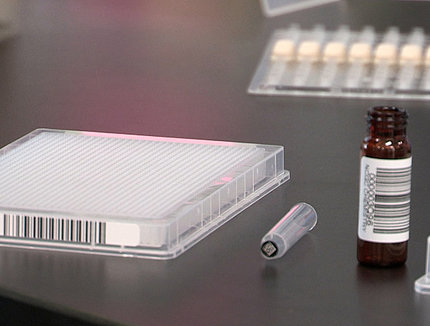A drug screening plate and a vial