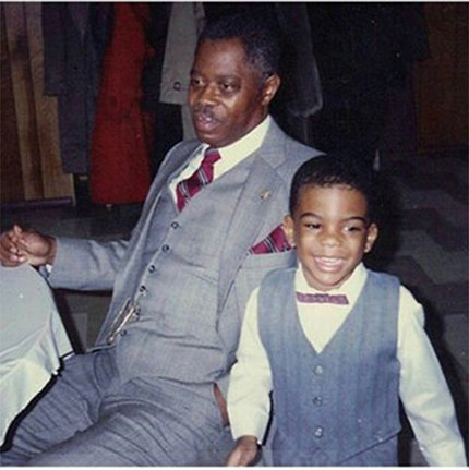 Green with his grandson, in suits, sitting together