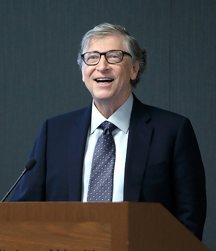 Bill Gates speaks at podium
