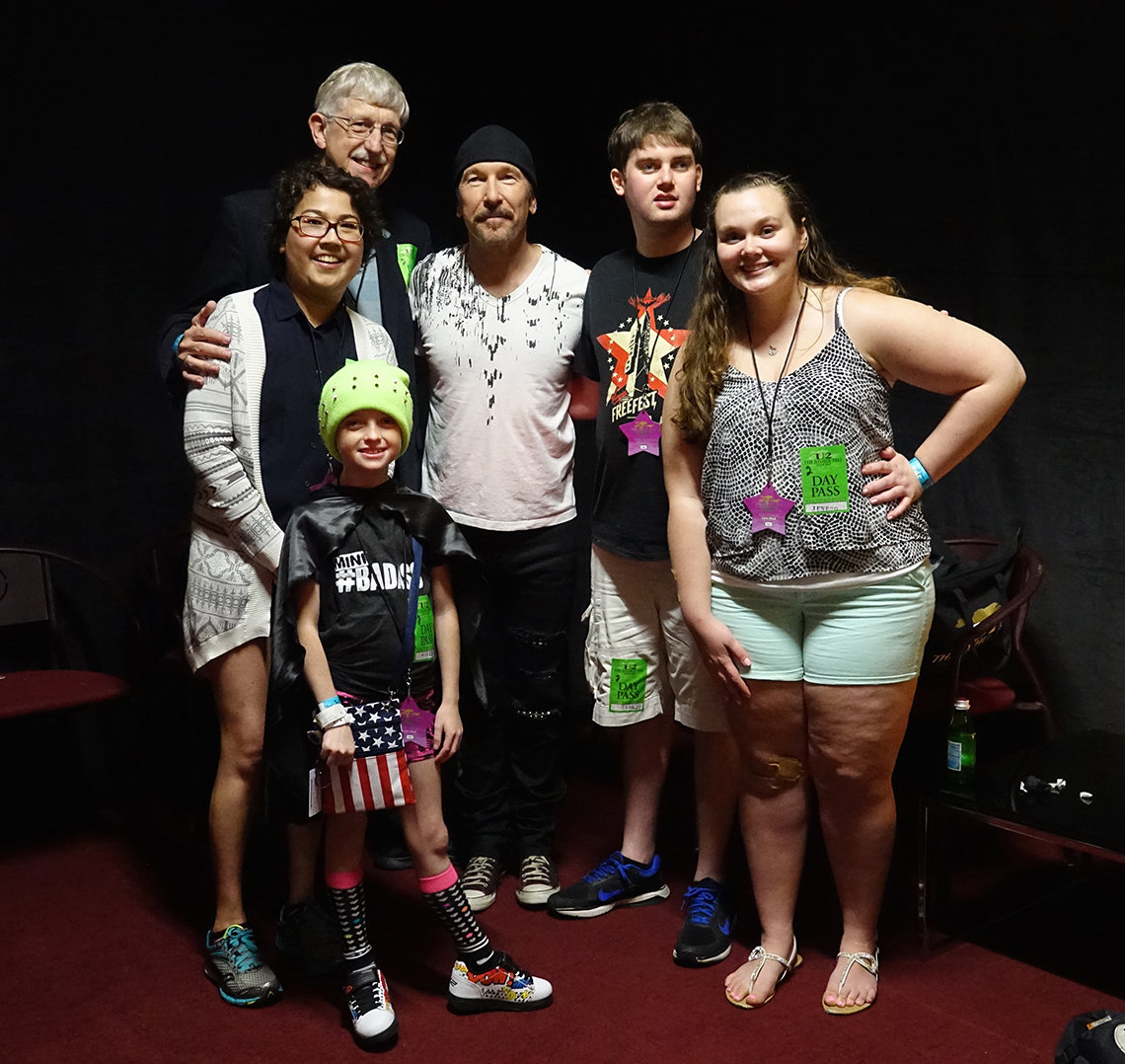 The Edge poses with all kids