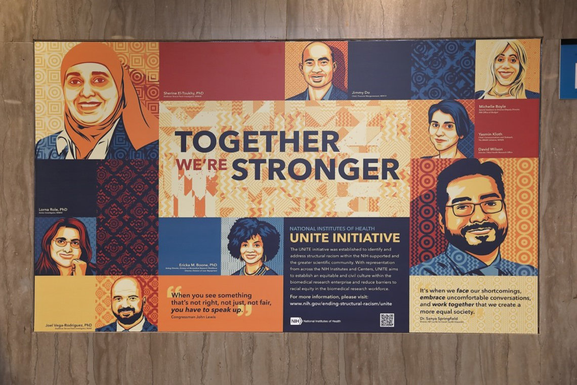 Colorful poster features several portraits of individuals from diverse racial and ethnic backgrounds with theme "Together We're Stronger" written in bold.