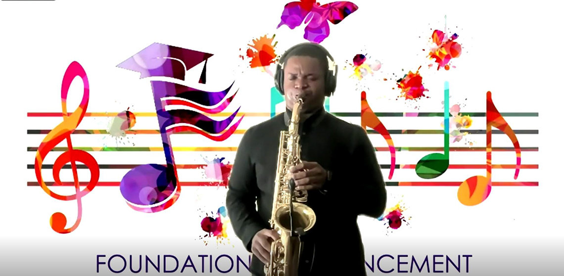 Hughes plays the saxaphone in front of a Zoom background featuring musical notes